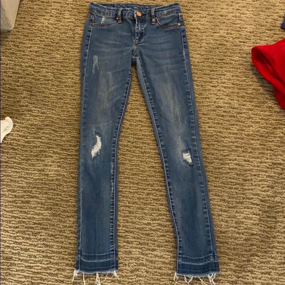 Dark washed ripped jeans